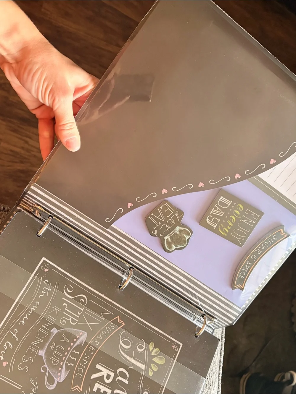 Black 'Recipes' book with divers